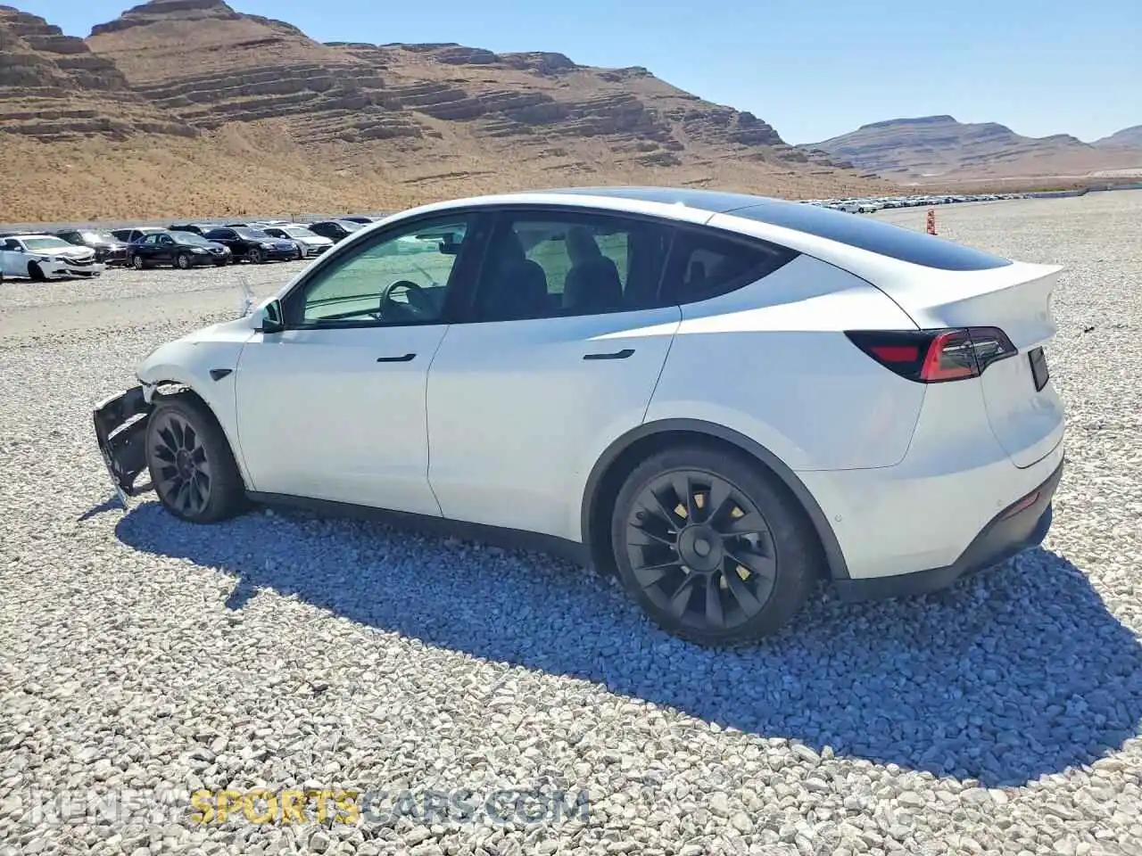 2 fotografías del automóvil dañado 5YJYGDEE3MF119775 TESLA MODEL Y 2021