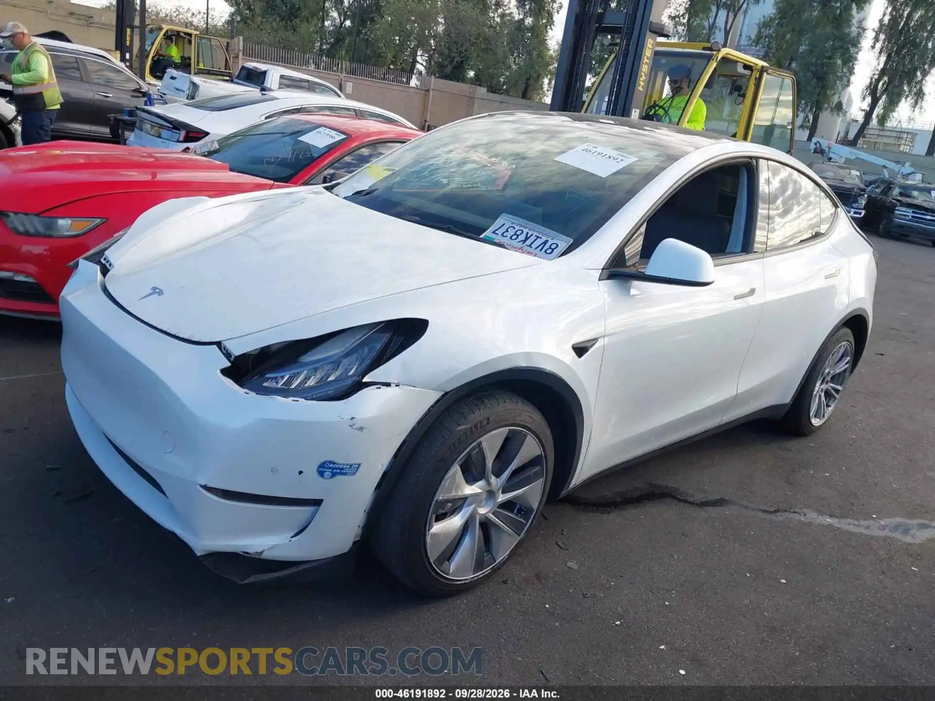 2 fotografías del automóvil dañado 5YJYGDEE3MF145616 TESLA MODEL Y 2021