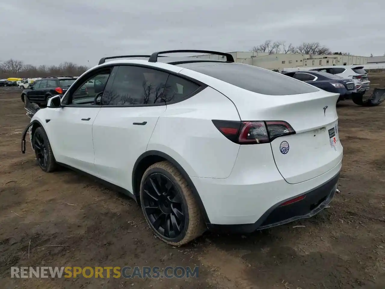 2 fotografías del automóvil dañado 5YJYGDEE3MF208729 TESLA MODEL Y 2021