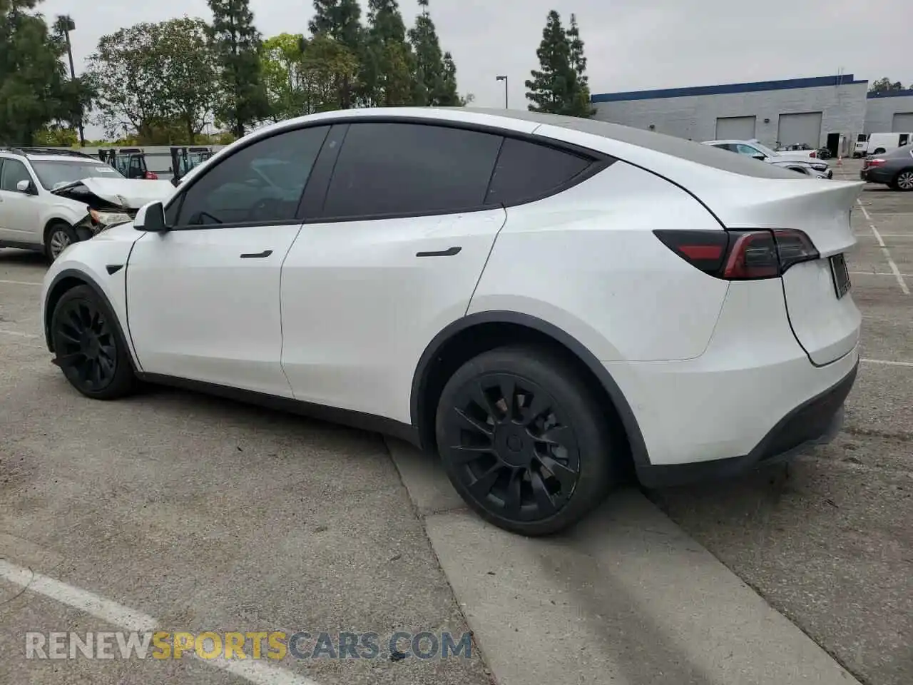 2 Photograph of a damaged car 5YJYGDEE3MF214823 TESLA MODEL Y 2021