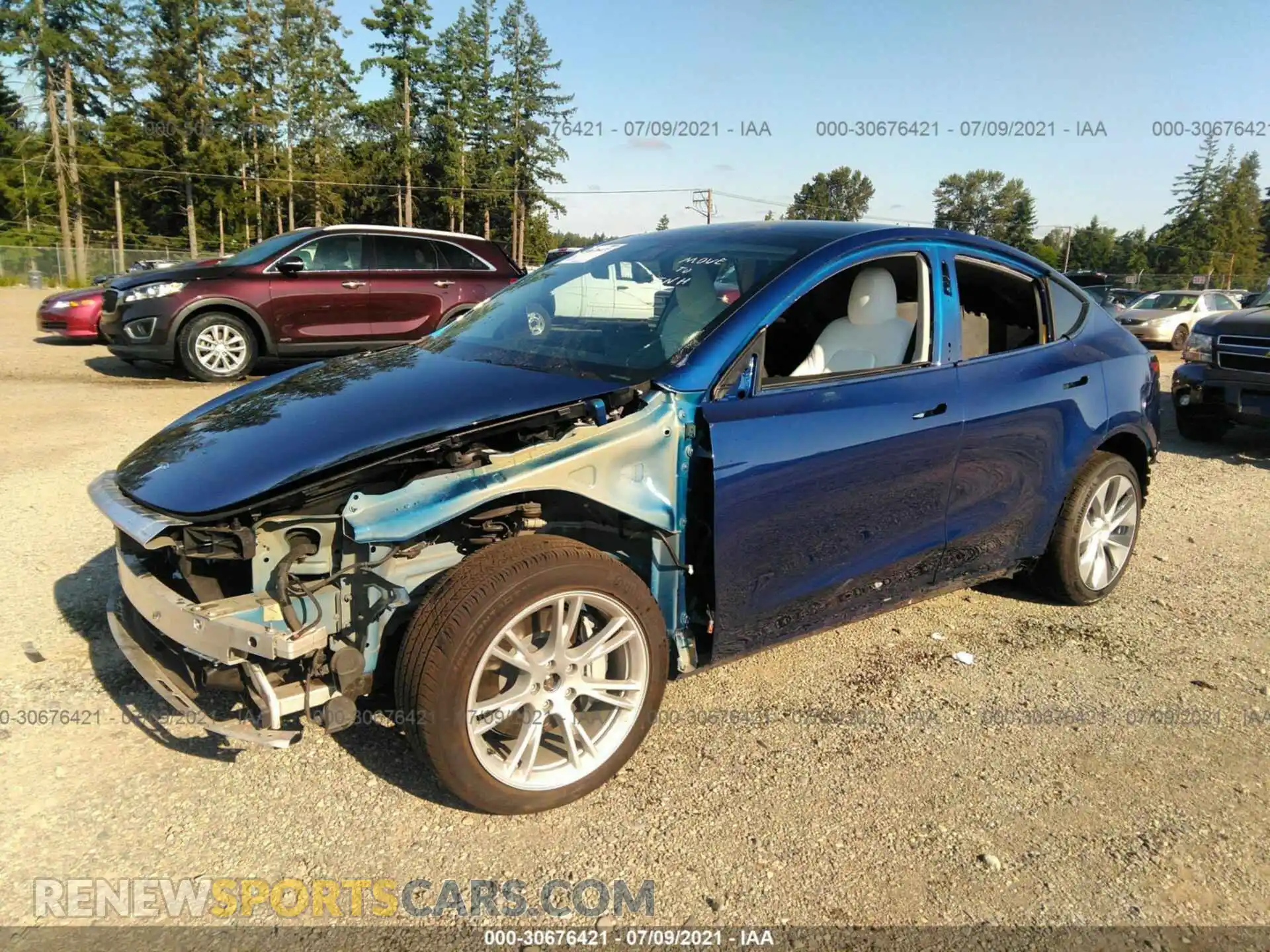 2 Photograph of a damaged car 5YJYGDEE4MF074829 TESLA MODEL Y 2021