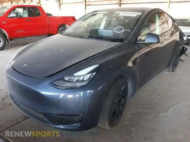 2 fotografías del automóvil dañado 5YJYGDEE4MF115461 TESLA MODEL Y 2021