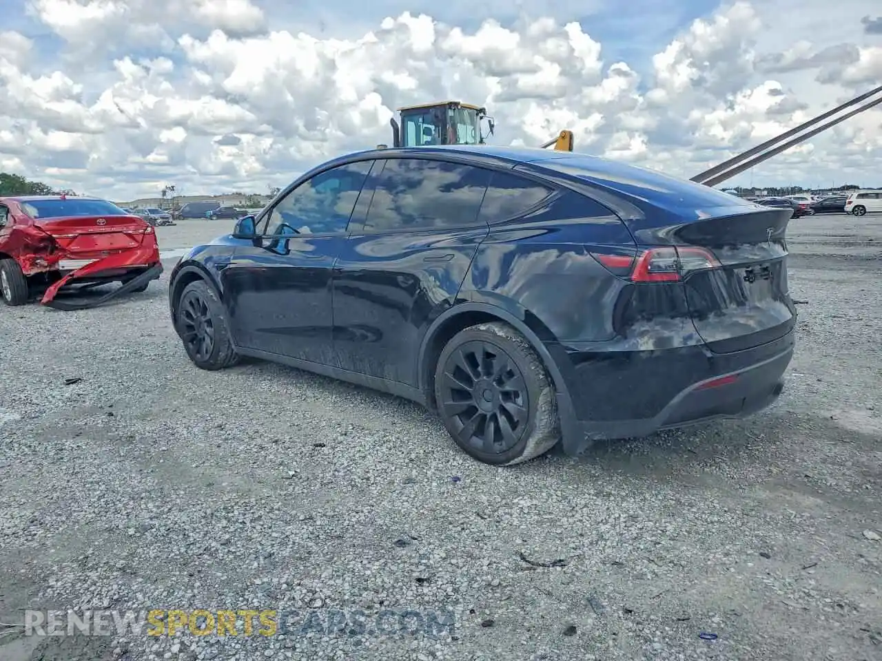 2 fotografías del automóvil dañado 5YJYGDEE4MF174364 TESLA MODEL Y 2021