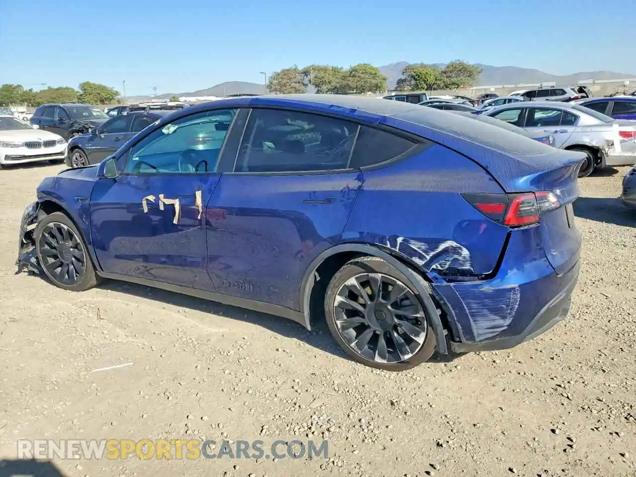 2 Photograph of a damaged car 5YJYGDEE4MF215558 TESLA MODEL Y 2021