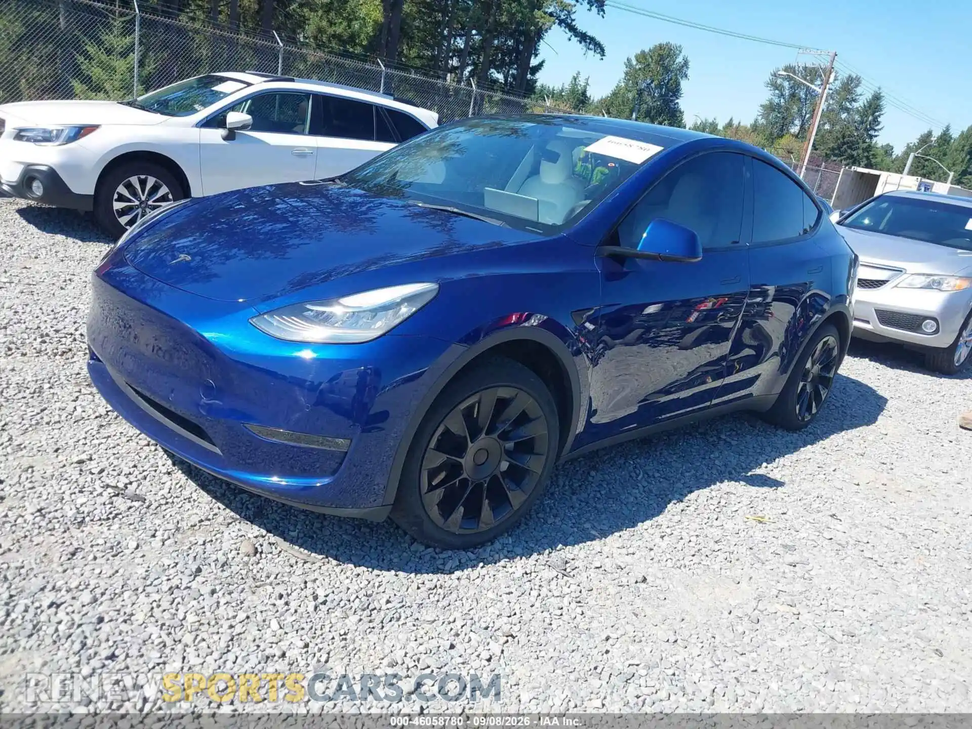 2 fotografías del automóvil dañado 5YJYGDEE4MF216354 TESLA MODEL Y 2021