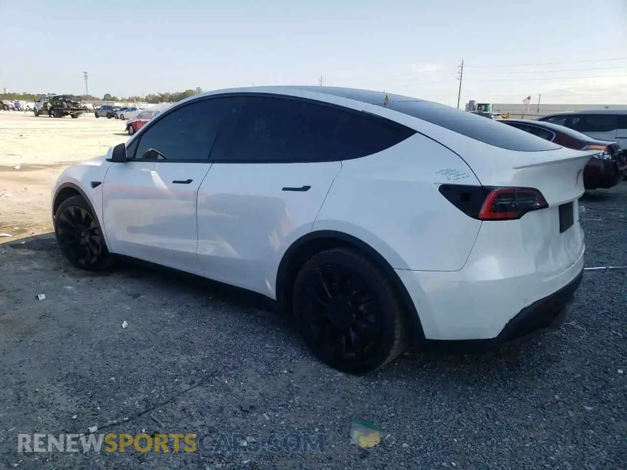 2 Photograph of a damaged car 5YJYGDEE5MF103450 TESLA MODEL Y 2021