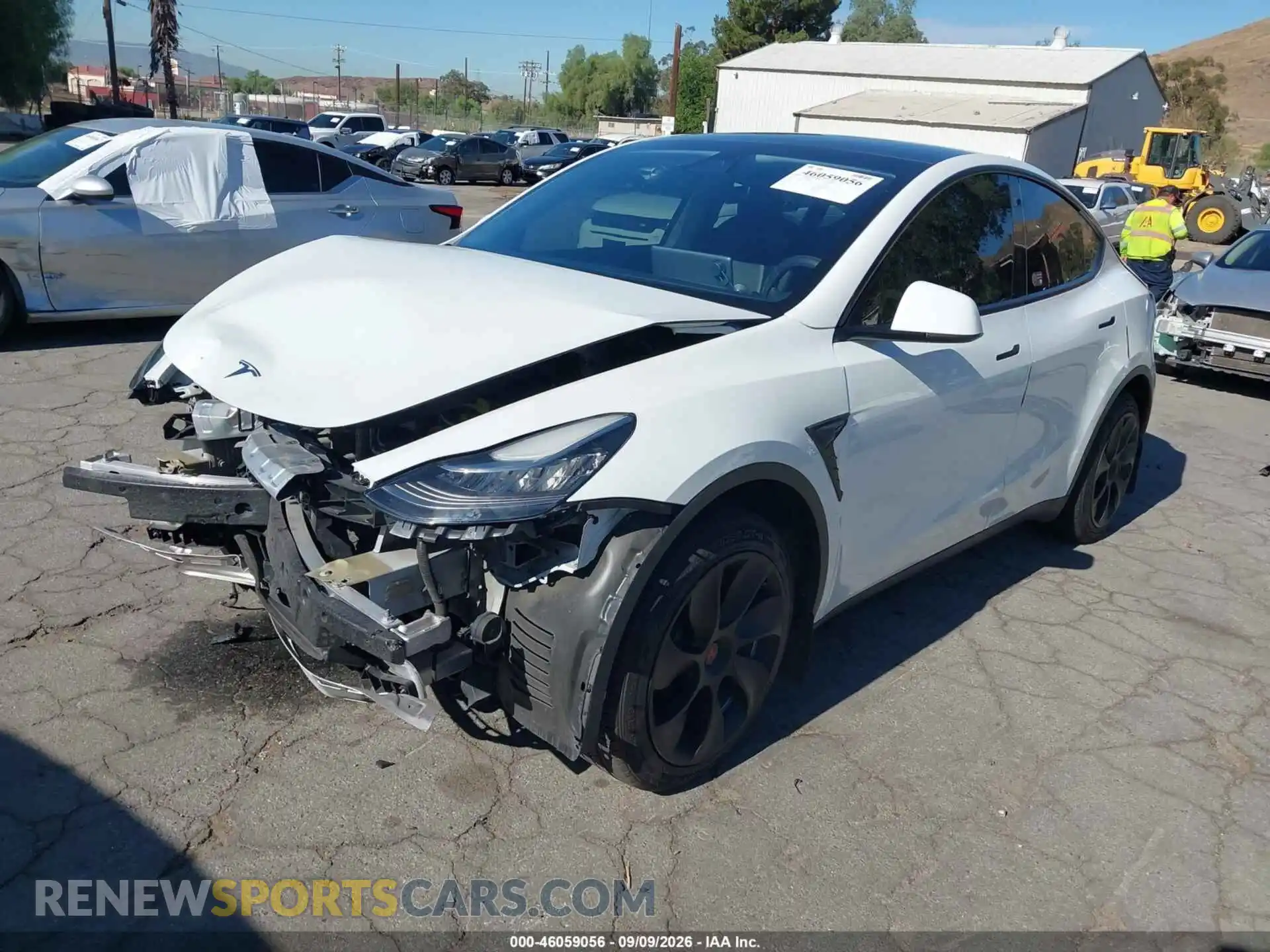 2 fotografías del automóvil dañado 5YJYGDEE5MF208280 TESLA MODEL Y 2021