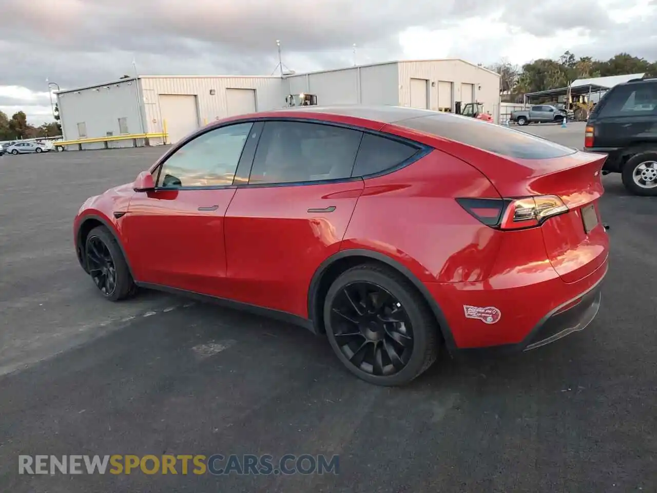 2 Photograph of a damaged car 5YJYGDEE6MF102856 TESLA MODEL Y 2021