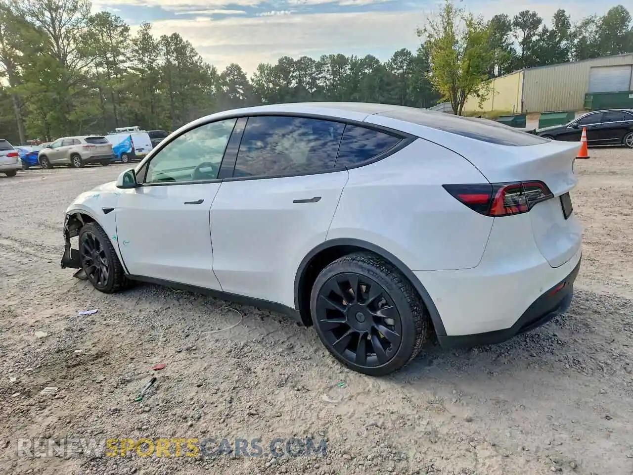 2 fotografías del automóvil dañado 5YJYGDEE6MF232166 TESLA MODEL Y 2021