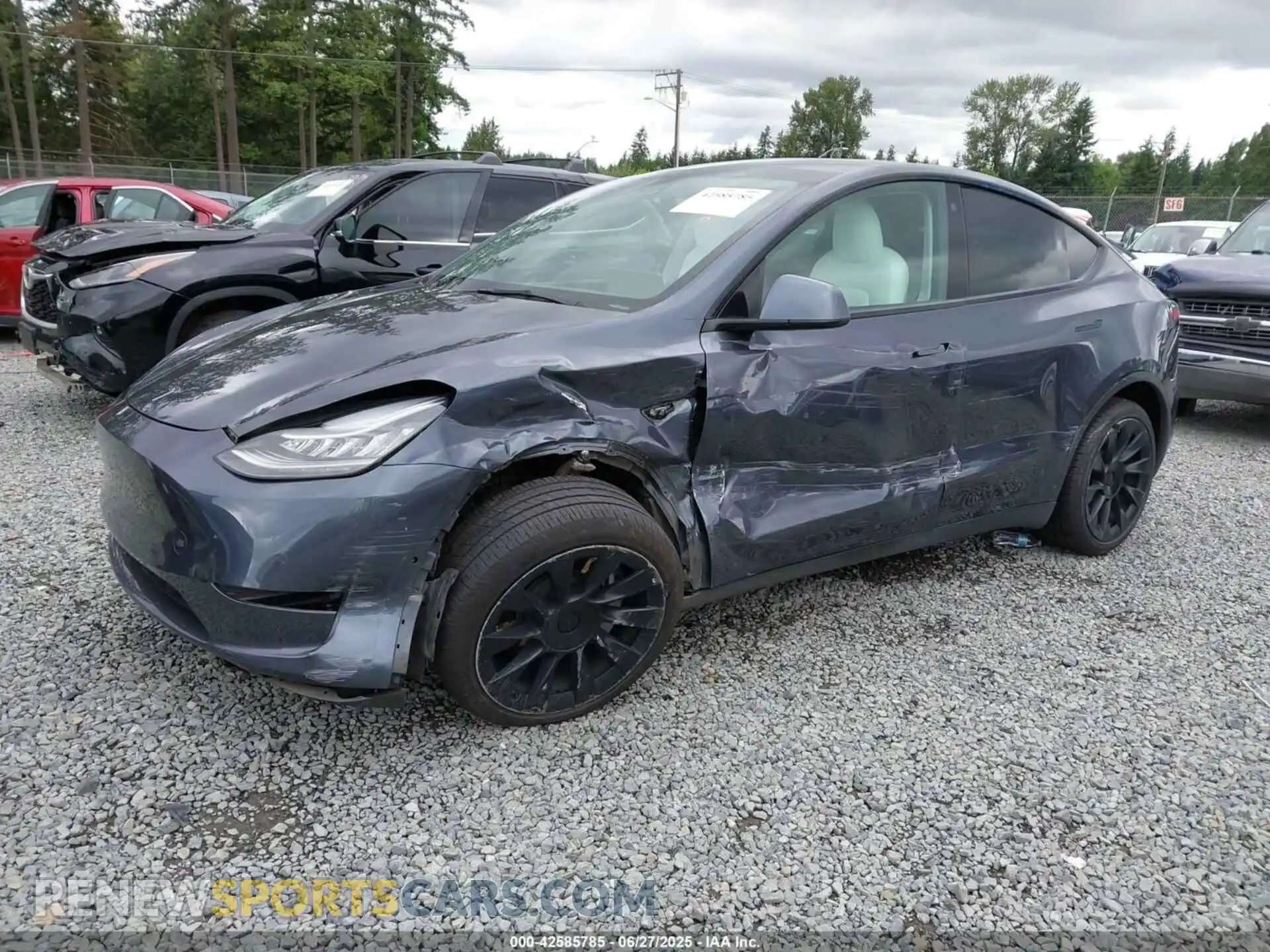 2 fotografías del automóvil dañado 5YJYGDEE7MF098042 TESLA MODEL Y 2021