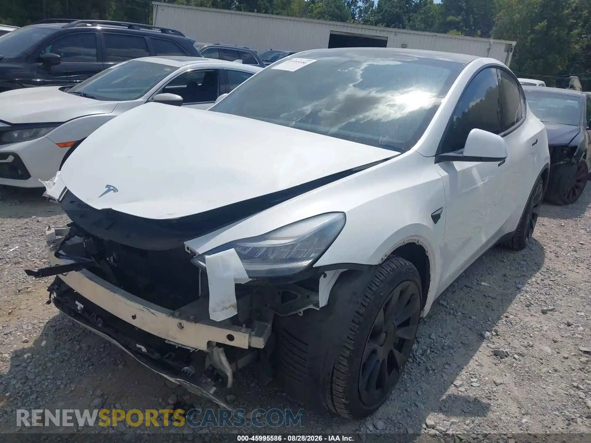 2 fotografías del automóvil dañado 5YJYGDEE7MF127393 TESLA MODEL Y 2021