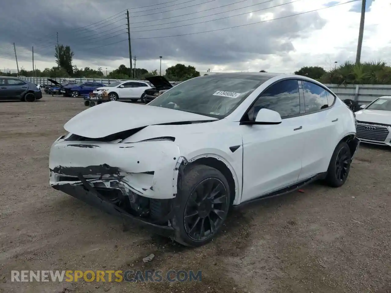 2 Photograph of a damaged car 5YJYGDEE7MF228952 TESLA MODEL Y 2021