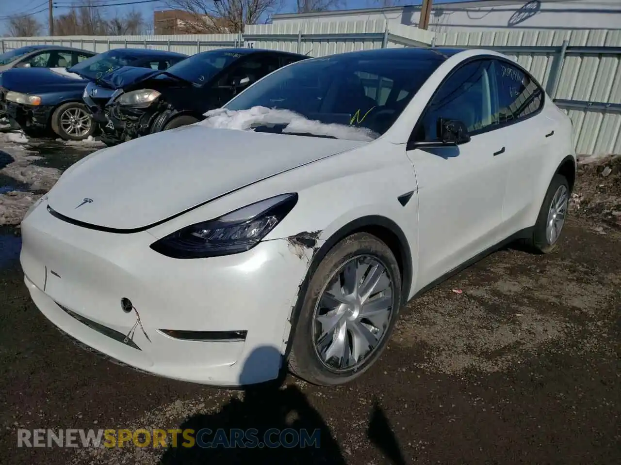 2 fotografías del automóvil dañado 5YJYGDEE8MF072579 TESLA MODEL Y 2021