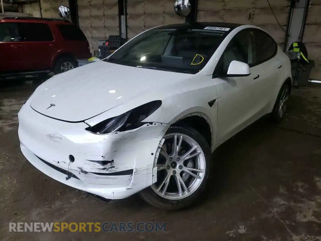 2 fotografías del automóvil dañado 5YJYGDEE8MF091424 TESLA MODEL Y 2021