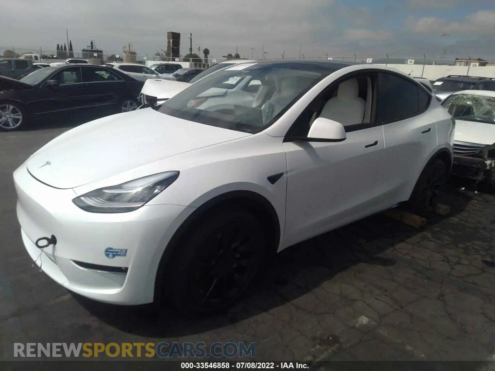 2 fotografías del automóvil dañado 5YJYGDEE8MF240463 TESLA MODEL Y 2021
