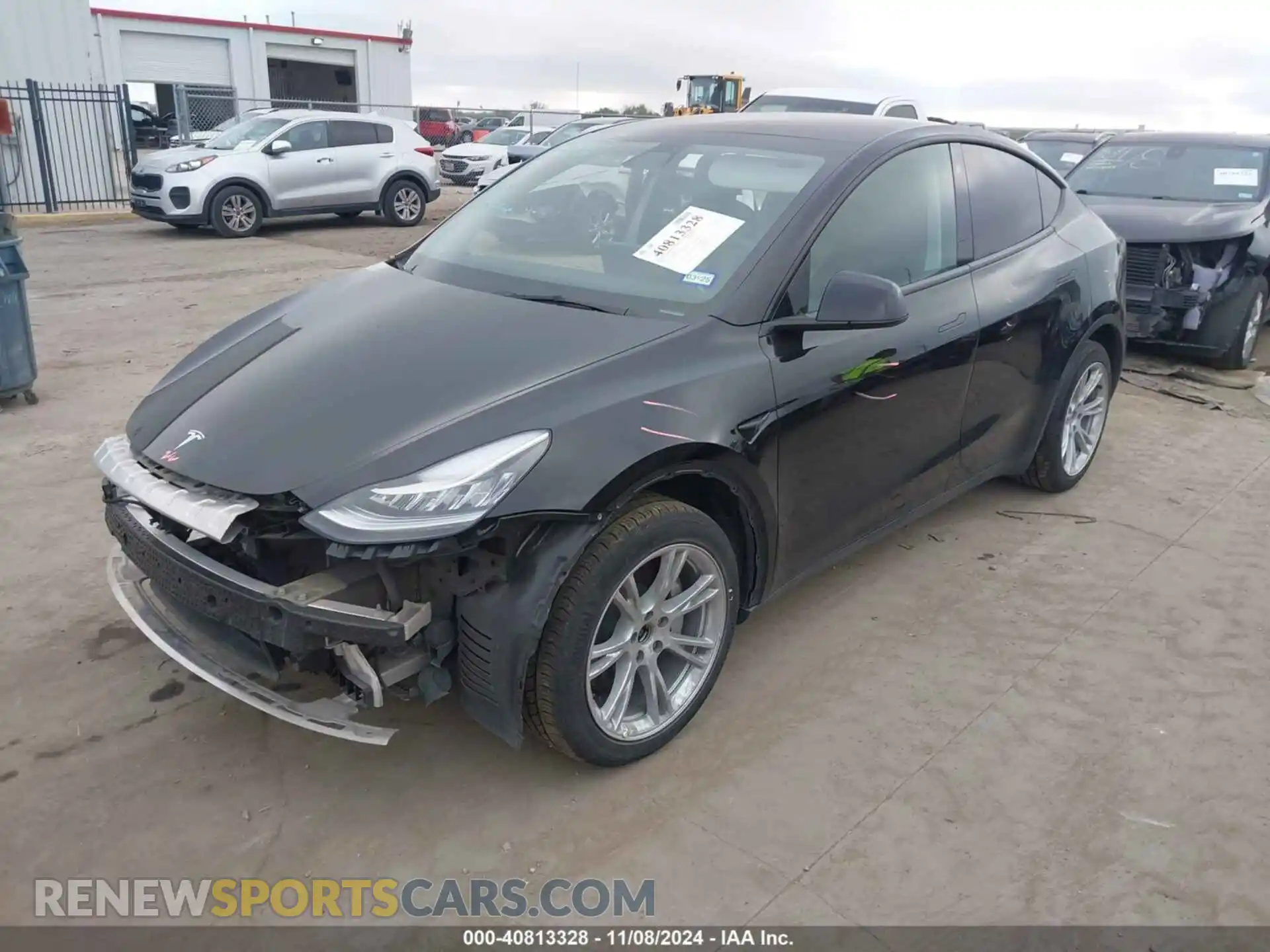2 fotografías del automóvil dañado 5YJYGDEE8MF281224 TESLA MODEL Y 2021