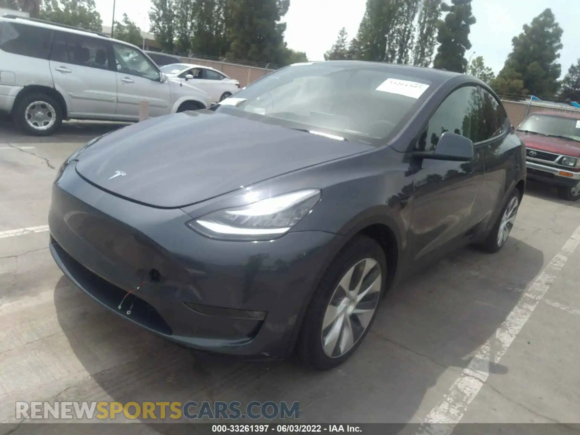 2 fotografías del automóvil dañado 5YJYGDEE8MF282096 TESLA MODEL Y 2021