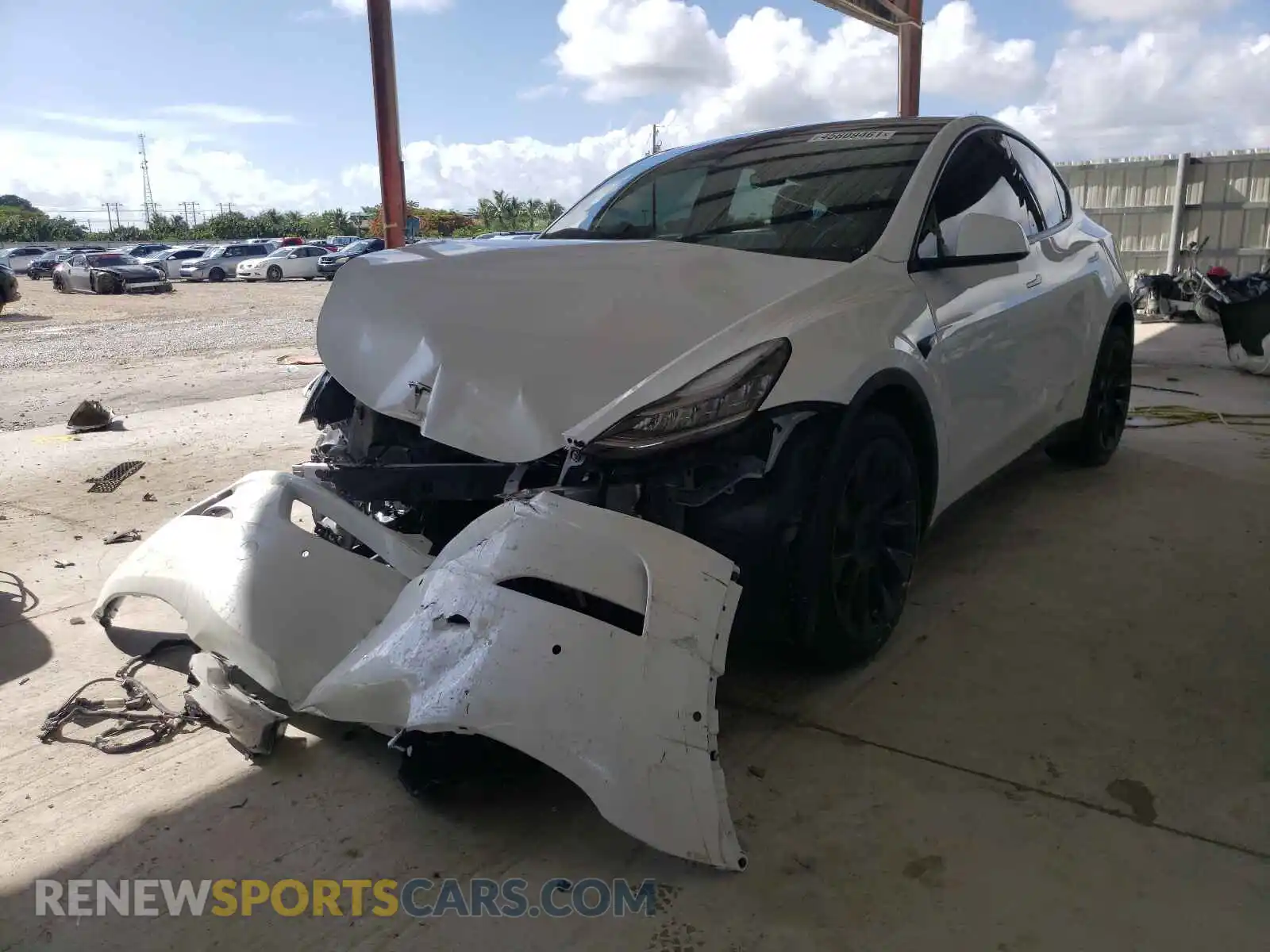 2 Photograph of a damaged car 5YJYGDEE9MF079721 TESLA MODEL Y 2021