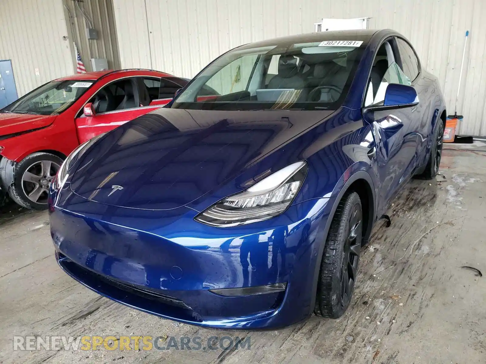 2 Photograph of a damaged car 5YJYGDEE9MF087558 TESLA MODEL Y 2021