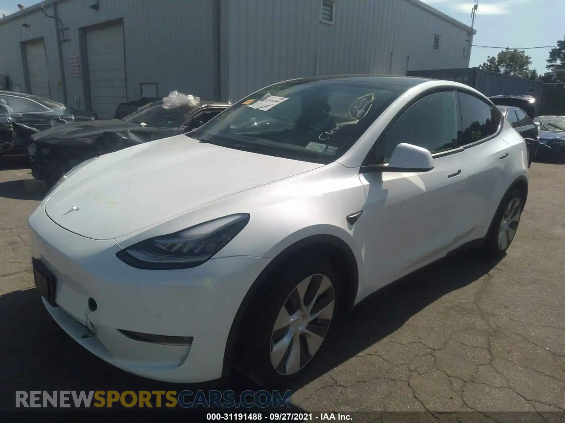 2 Photograph of a damaged car 5YJYGDEE9MF106769 TESLA MODEL Y 2021