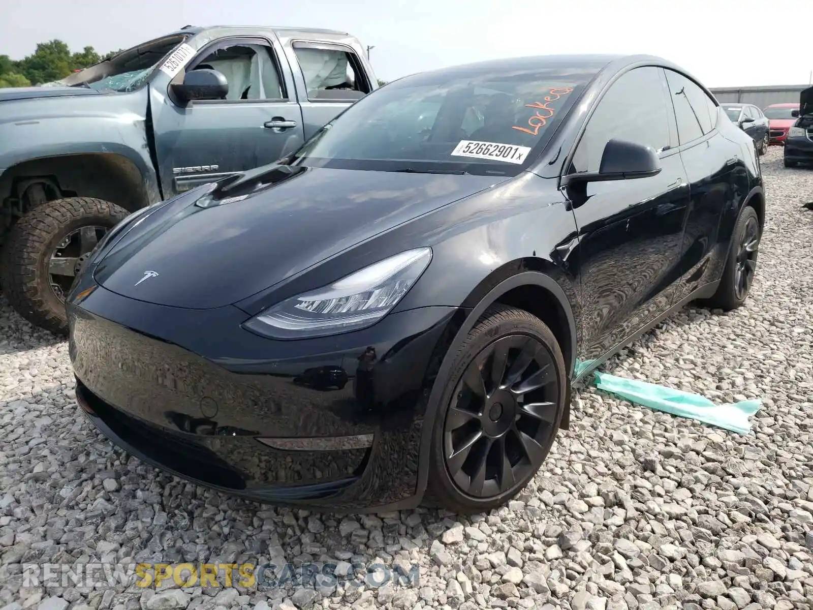2 Photograph of a damaged car 5YJYGDEE9MF107923 TESLA MODEL Y 2021