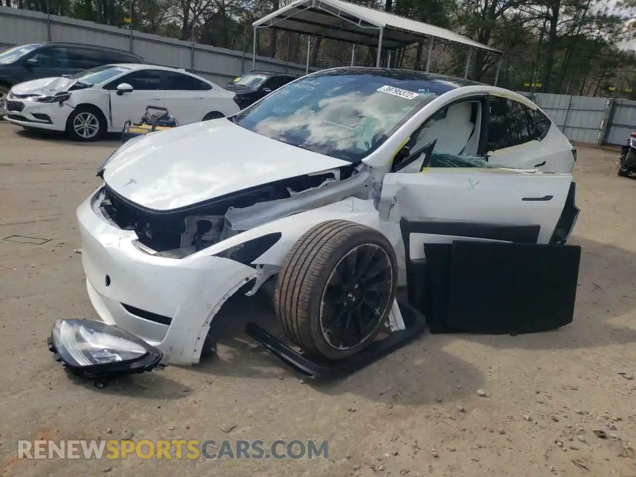 2 Photograph of a damaged car 5YJYGDEE9MF202773 TESLA MODEL Y 2021