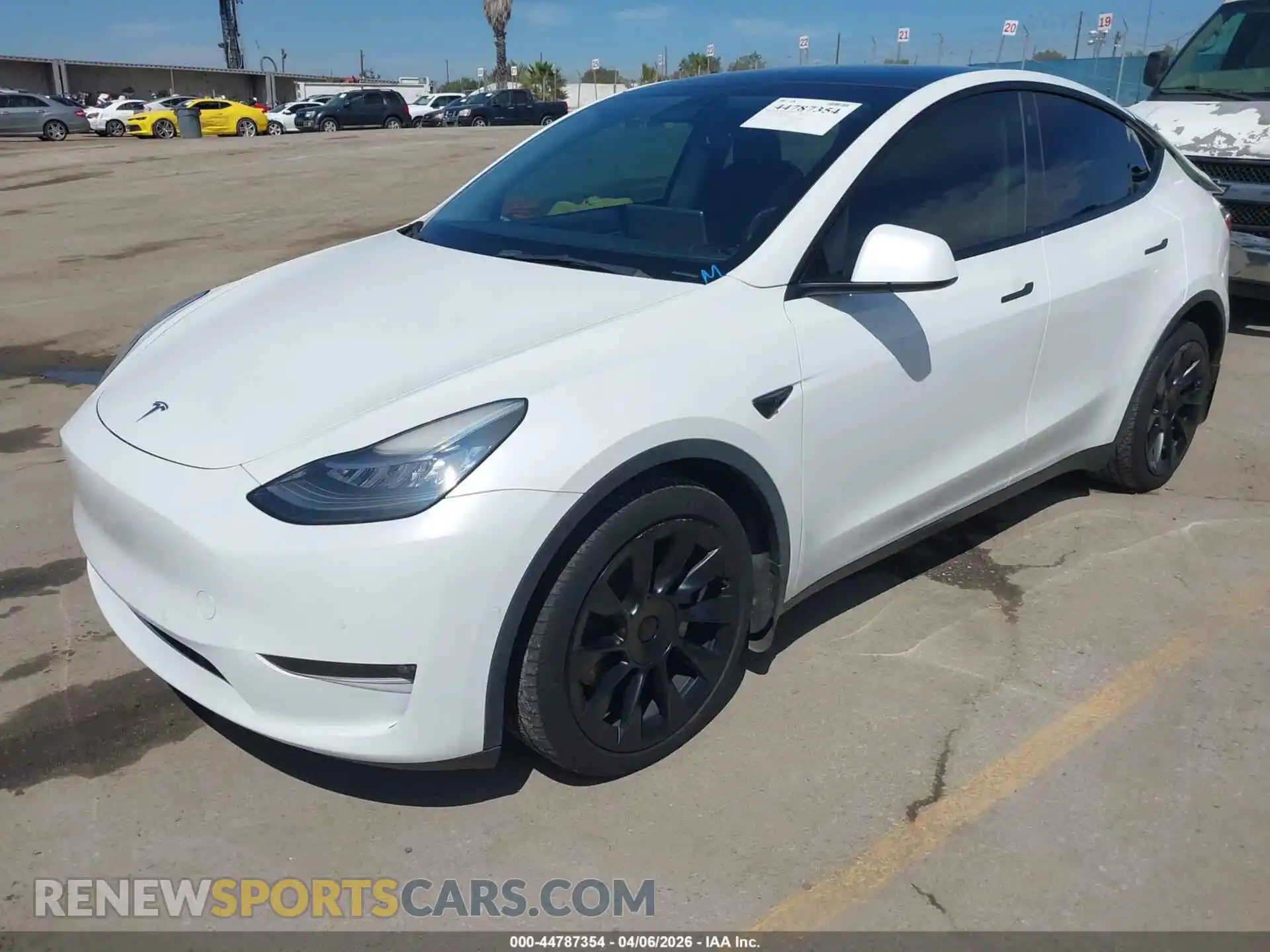 2 Photograph of a damaged car 5YJYGDEE9MF202899 TESLA MODEL Y 2021