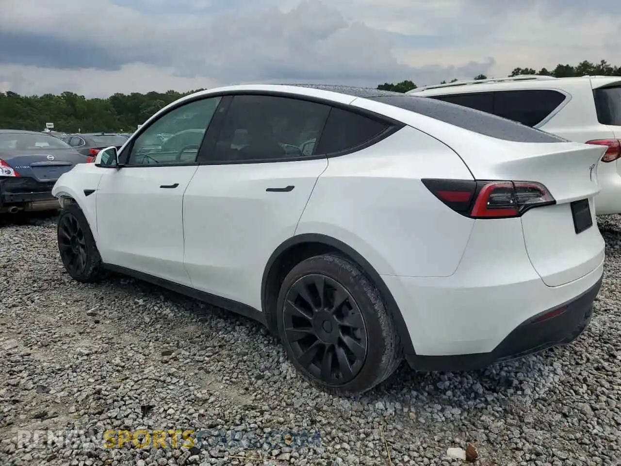 2 fotografías del automóvil dañado 5YJYGDEEXMF064290 TESLA MODEL Y 2021