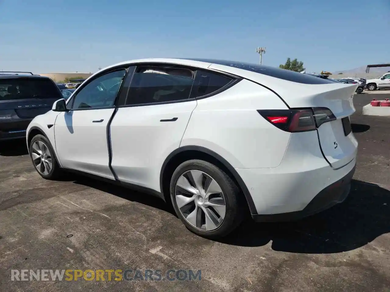 2 fotografías del automóvil dañado 5YJYGDEEXMF203558 TESLA MODEL Y 2021