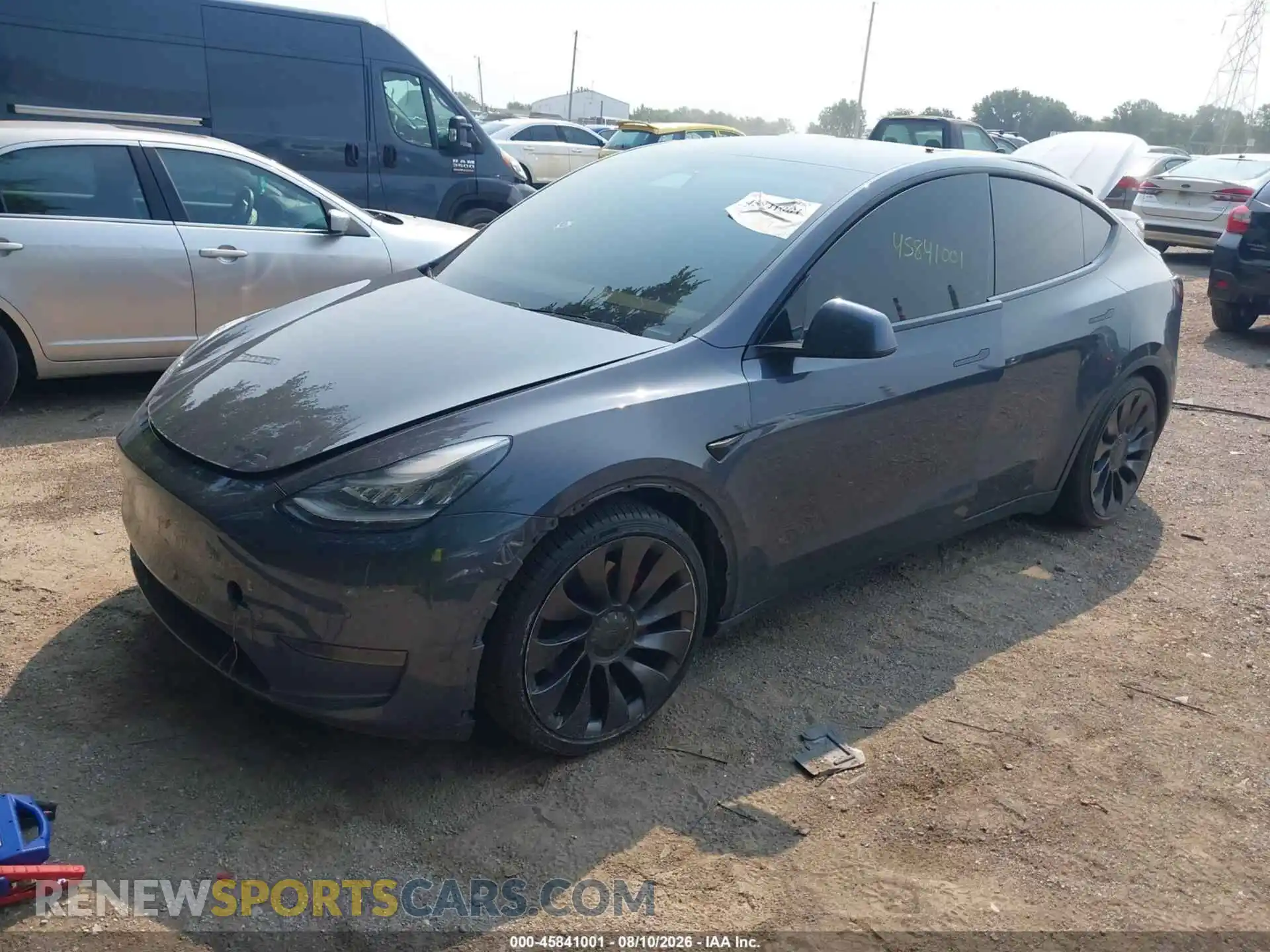 2 fotografías del automóvil dañado 5YJYGDEF0MF081740 TESLA MODEL Y 2021