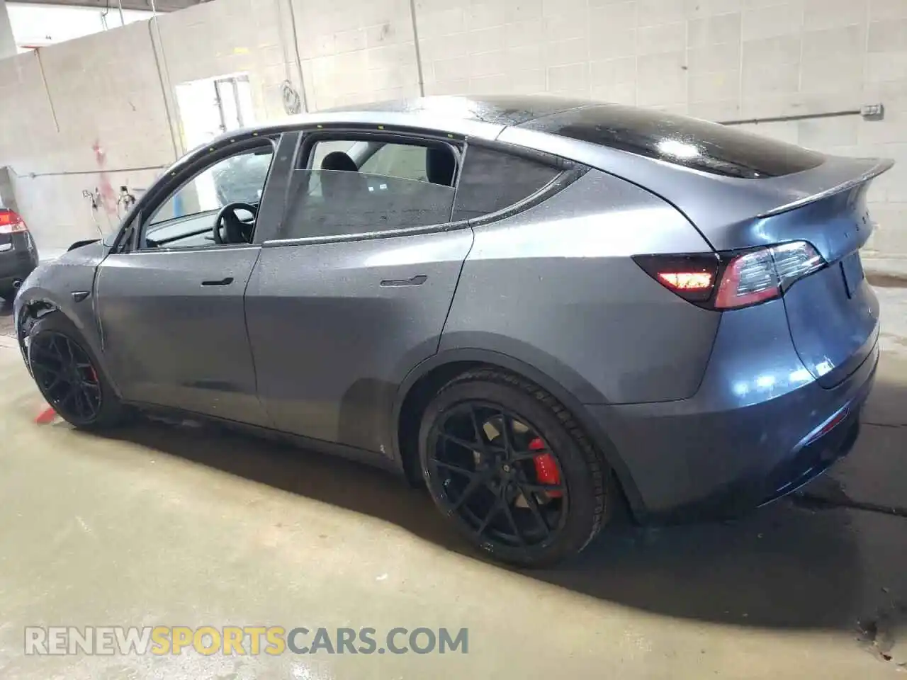 2 fotografías del automóvil dañado 5YJYGDEF2MF134700 TESLA MODEL Y 2021