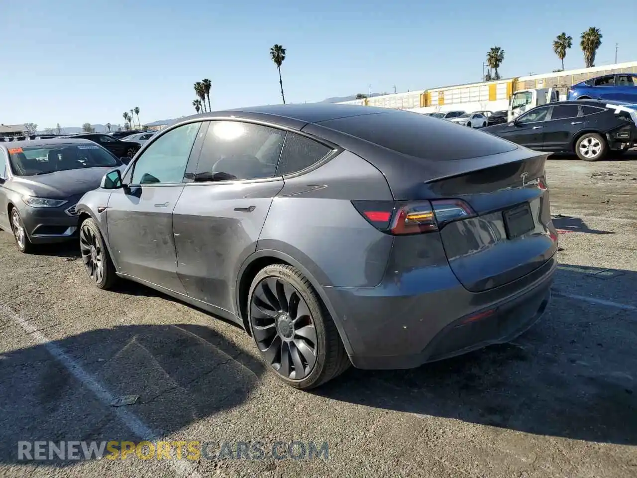 2 Photograph of a damaged car 5YJYGDEF3MF194730 TESLA MODEL Y 2021