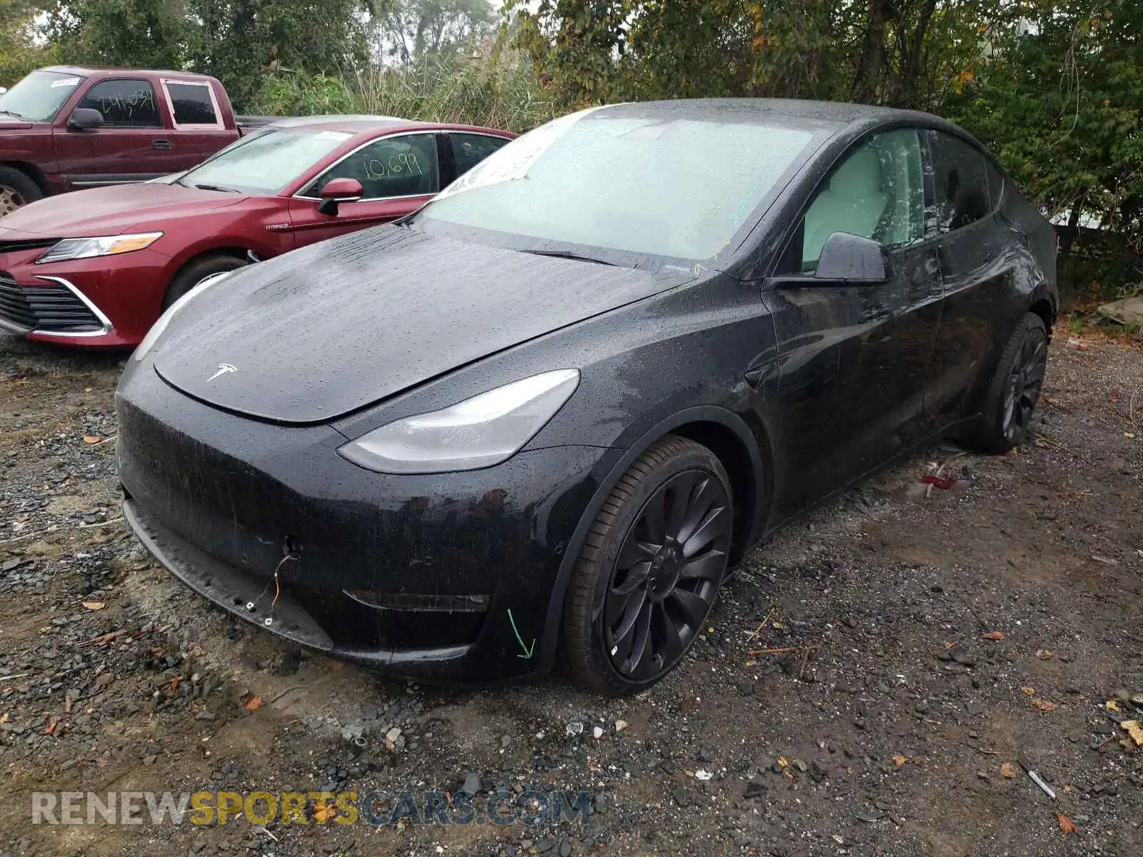 2 Photograph of a damaged car 5YJYGDEF3MF242999 TESLA MODEL Y 2021