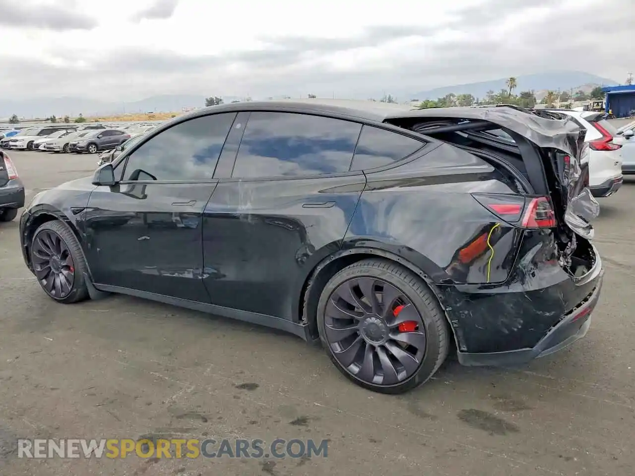 2 fotografías del automóvil dañado 5YJYGDEF4MF251971 TESLA MODEL Y 2021
