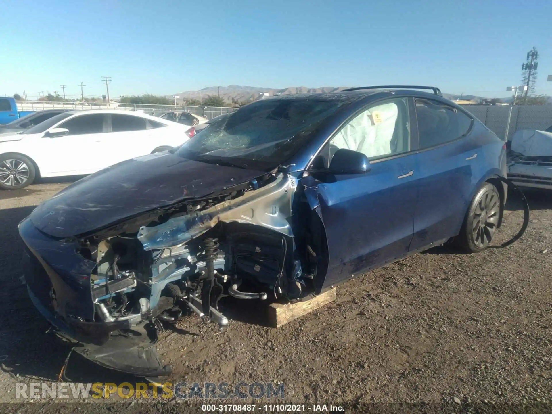 2 Photograph of a damaged car 5YJYGDEF5MF151412 TESLA MODEL Y 2021