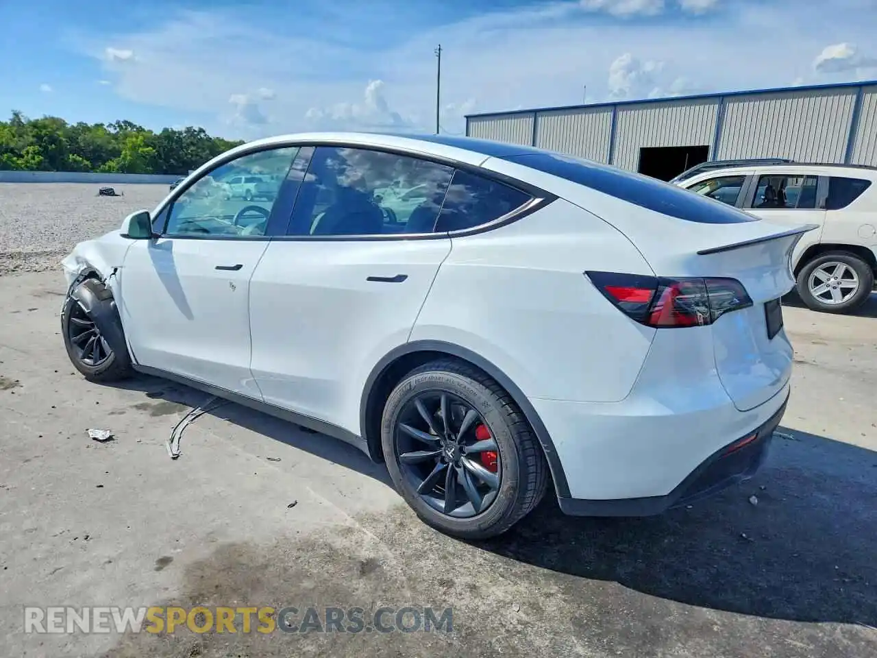2 fotografías del automóvil dañado 5YJYGDEF6MF306503 TESLA MODEL Y 2021