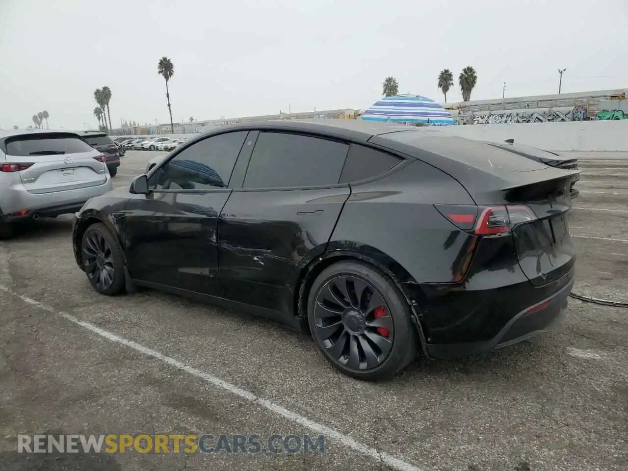 2 fotografías del automóvil dañado 5YJYGDEF7MF195038 TESLA MODEL Y 2021
