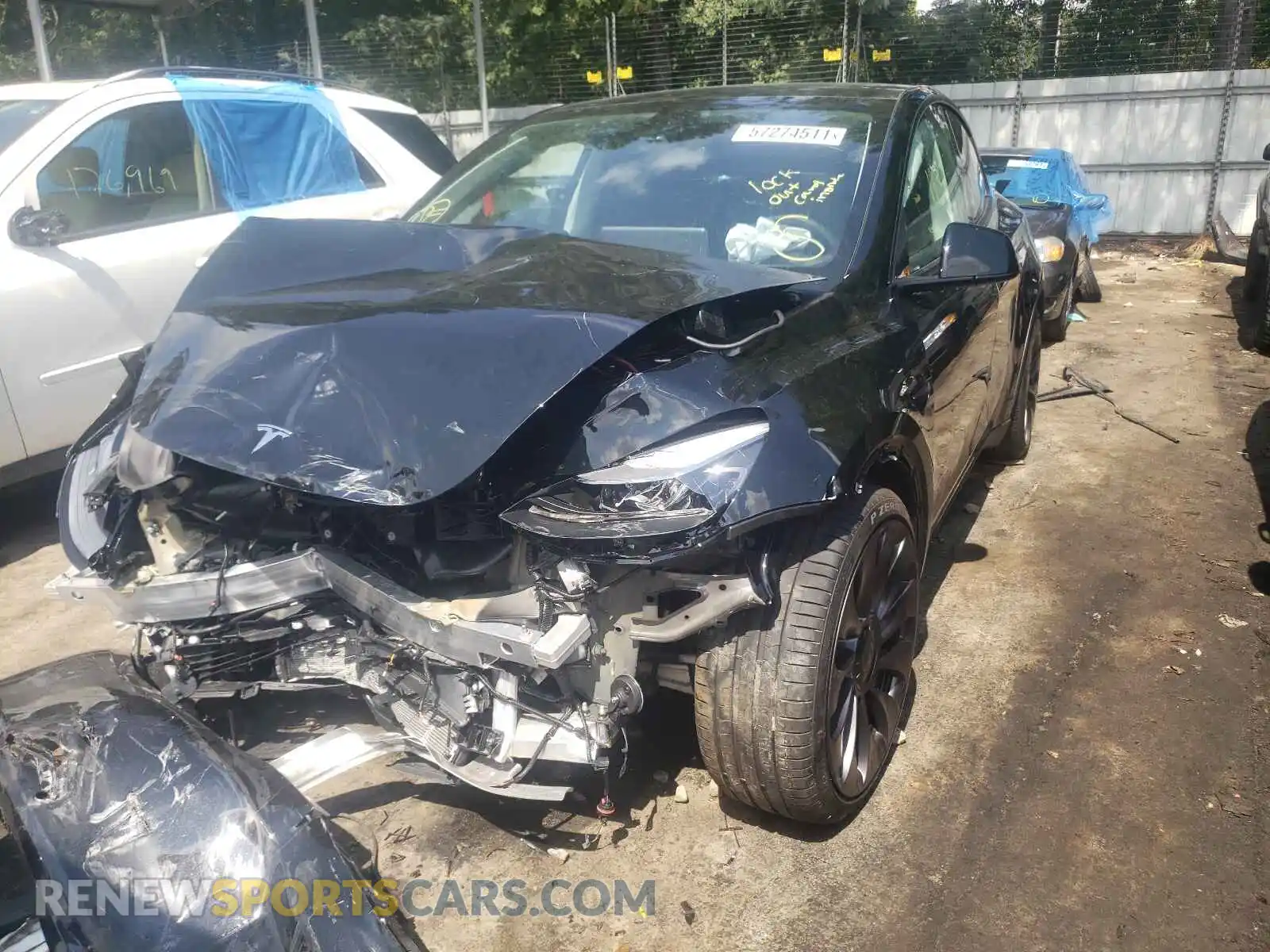 2 fotografías del automóvil dañado 5YJYGDEFXMF202189 TESLA MODEL Y 2021