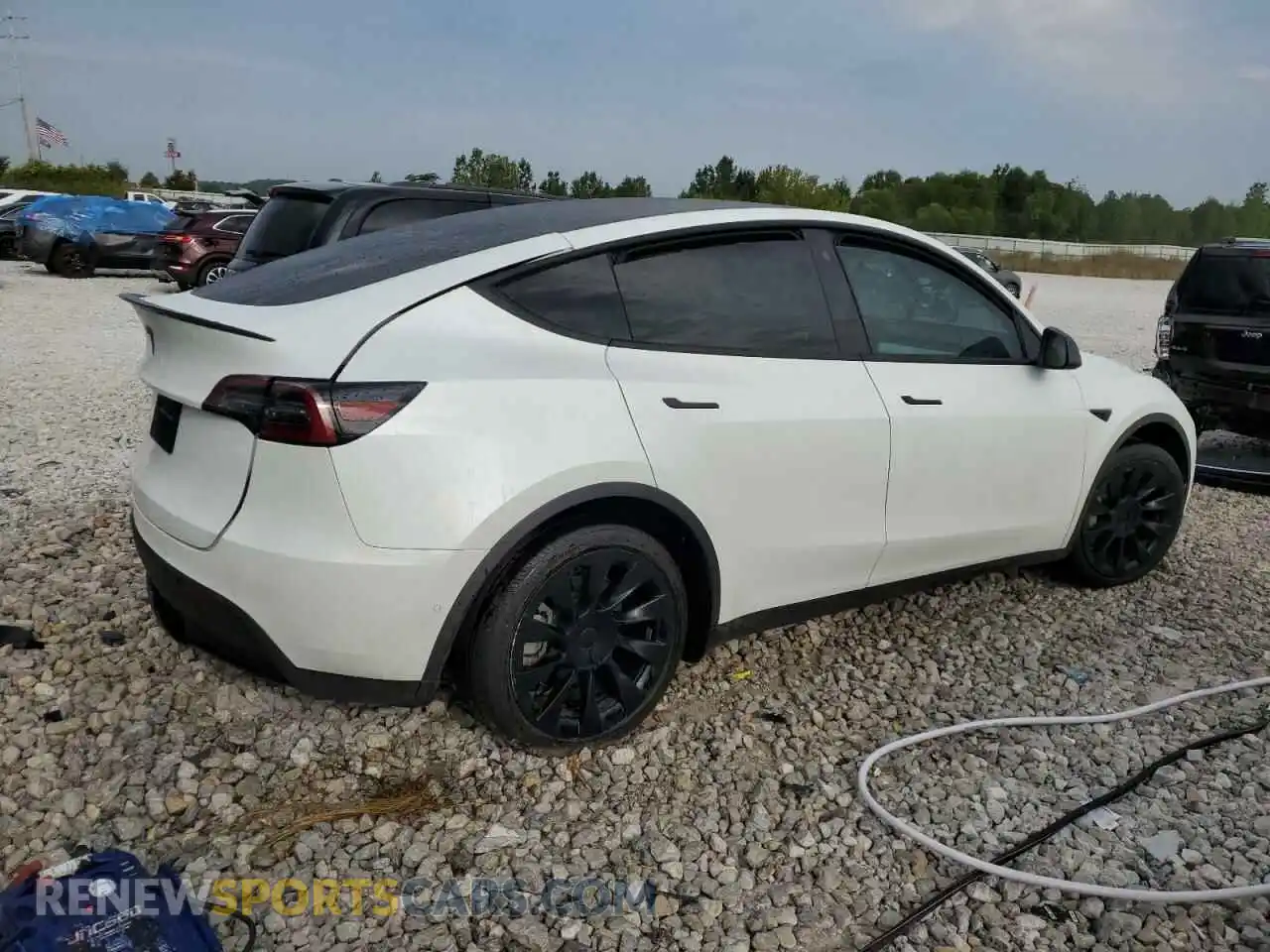 3 Photograph of a damaged car 7SAYGAEE0NF521885 TESLA MODEL Y 2022