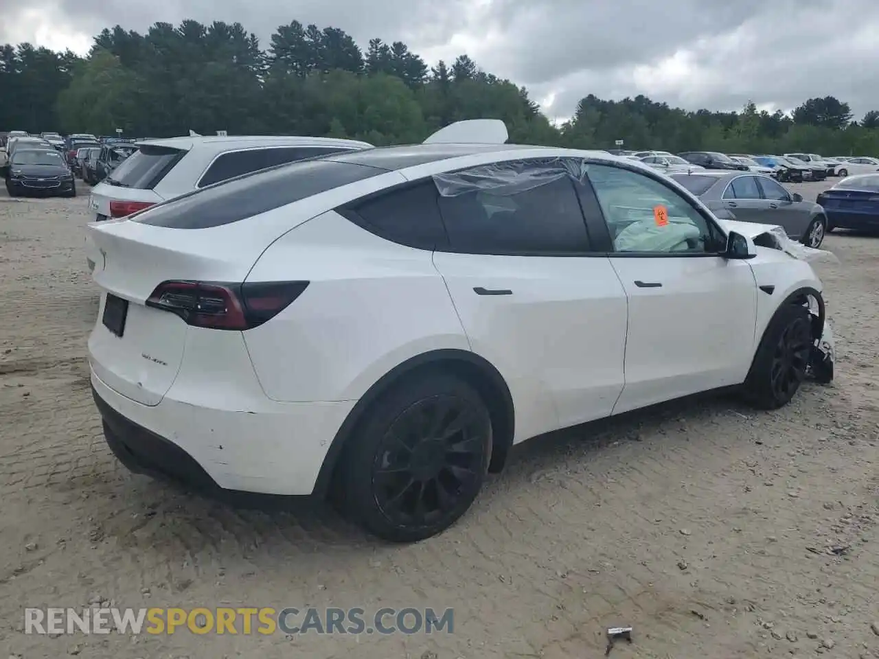 3 Photograph of a damaged car 7SAYGAEE3NF412496 TESLA MODEL Y 2022