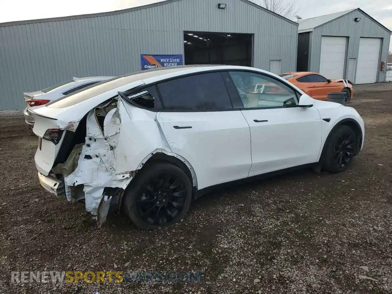 3 Photograph of a damaged car 7SAYGAEE3NF514817 TESLA MODEL Y 2022