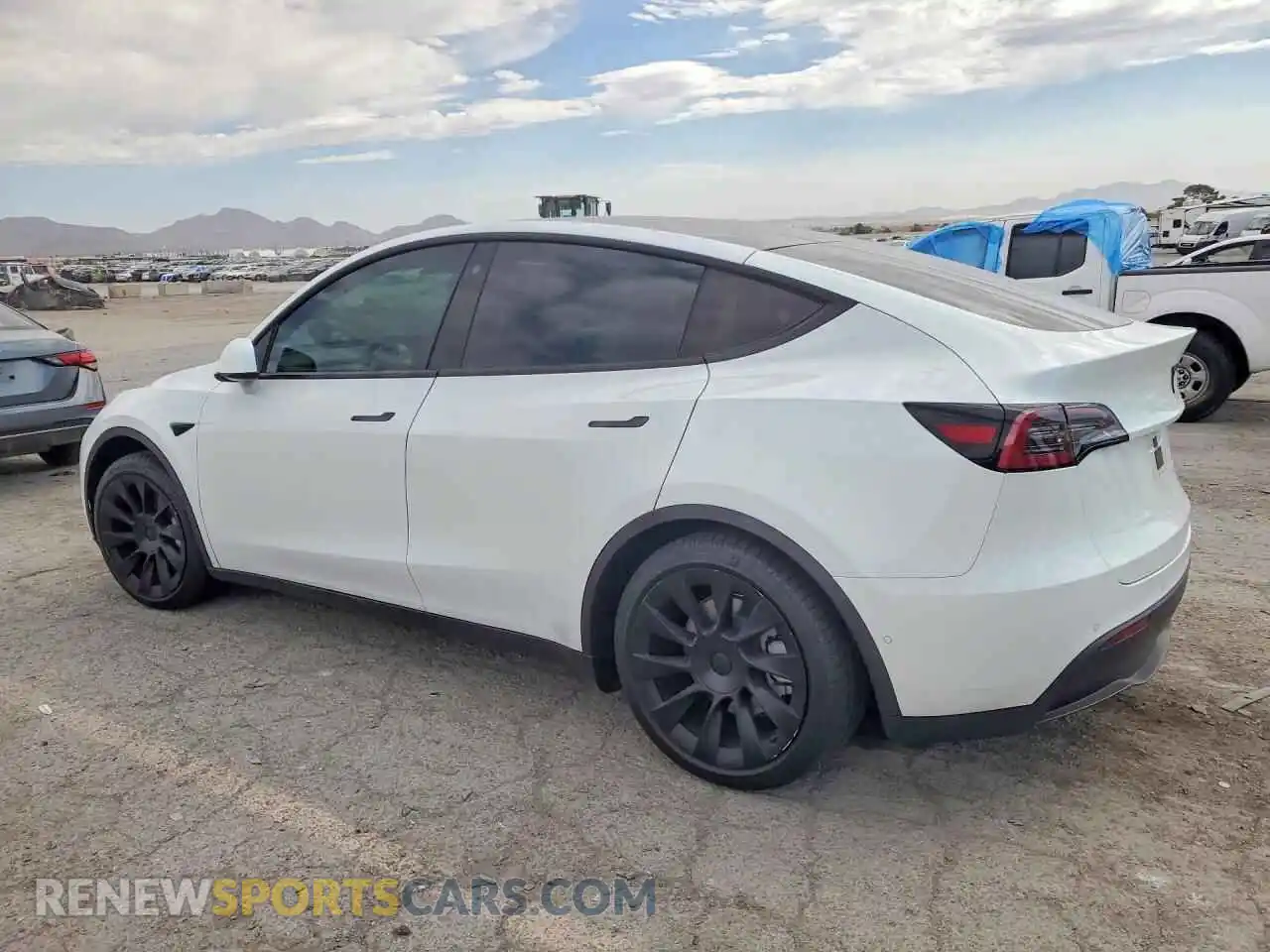 2 fotografías del automóvil dañado 7SAYGAEE6NF316538 TESLA MODEL Y 2022
