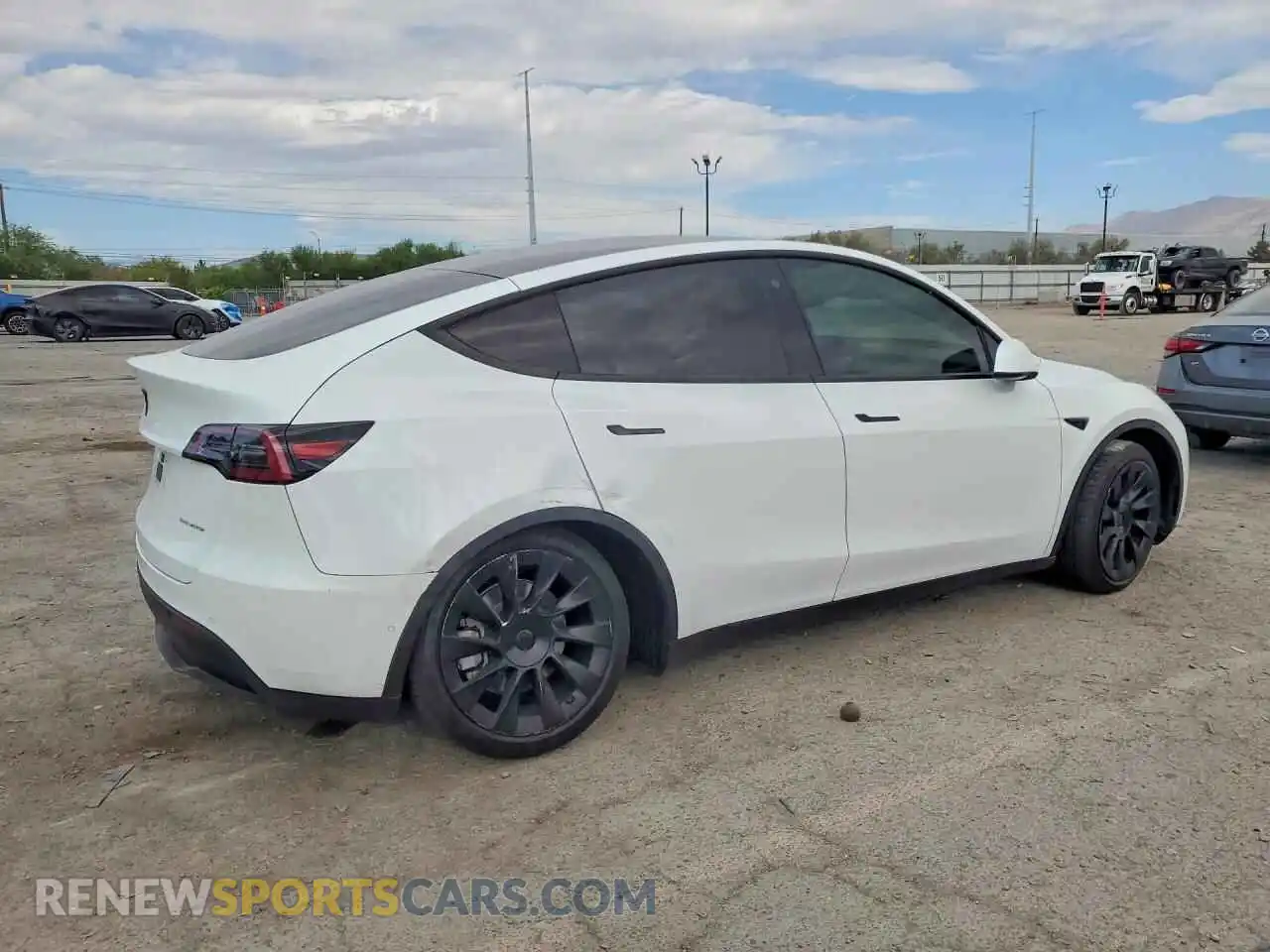 3 fotografías del automóvil dañado 7SAYGAEE6NF316538 TESLA MODEL Y 2022