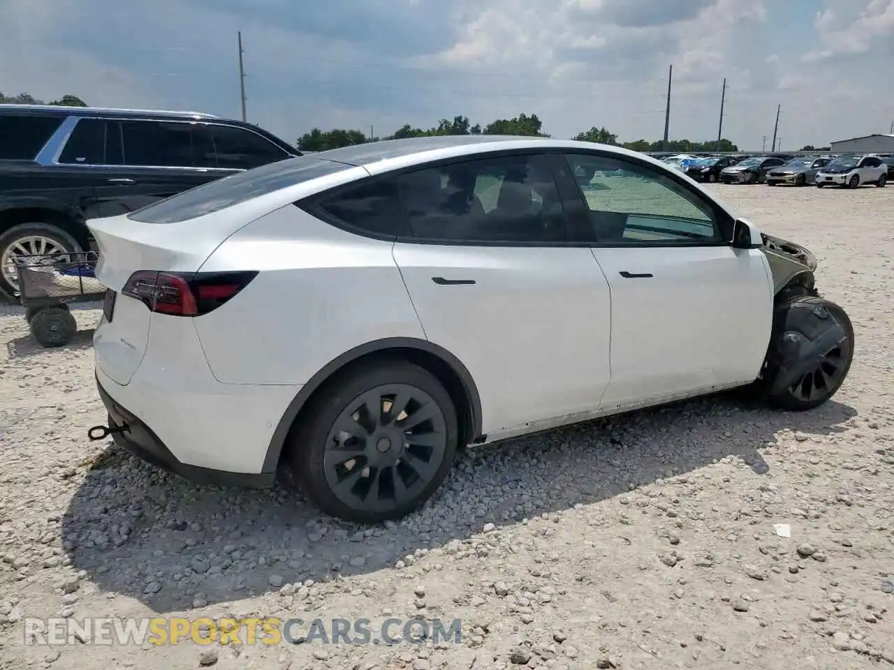 3 Photograph of a damaged car 7SAYGDEE1NA010877 TESLA MODEL Y 2022