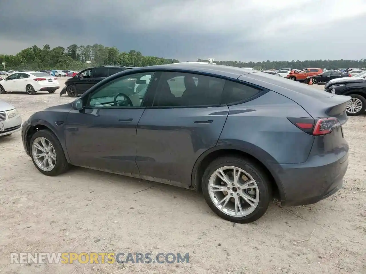 2 Photograph of a damaged car 7SAYGDEE2NA001699 TESLA MODEL Y 2022