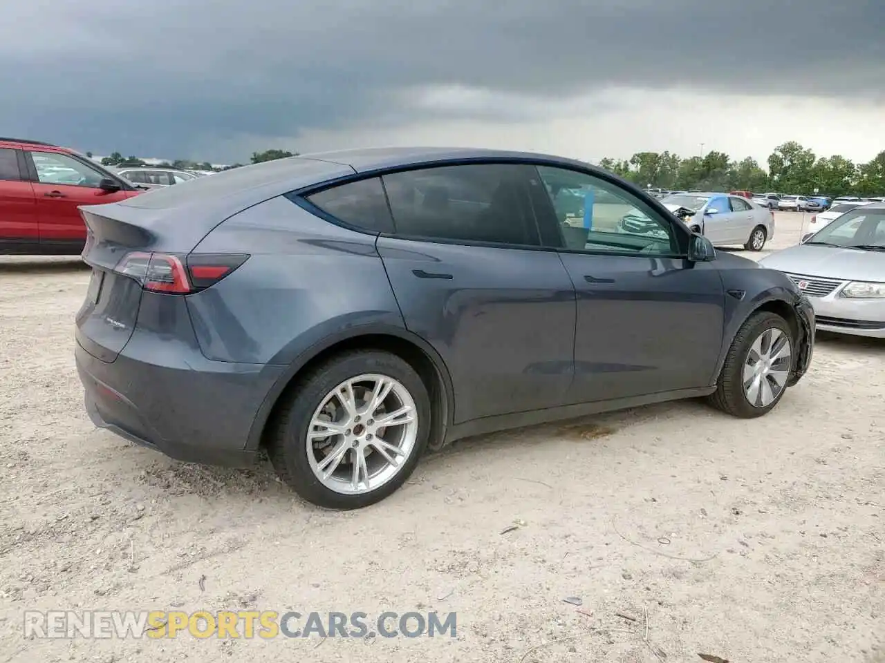 3 Photograph of a damaged car 7SAYGDEE2NA001699 TESLA MODEL Y 2022