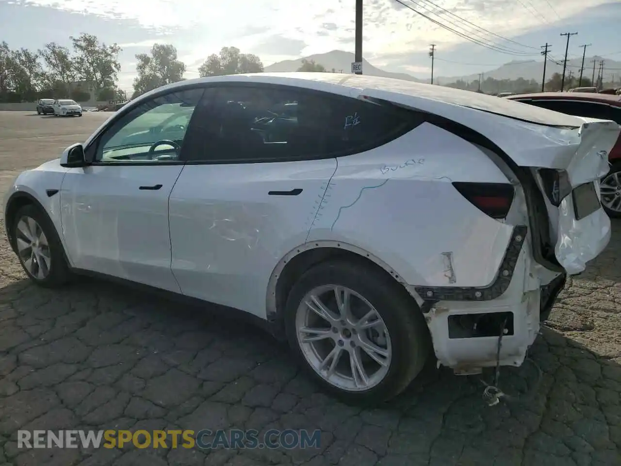 2 fotografías del automóvil dañado 7SAYGDEE2NF427024 TESLA MODEL Y 2022