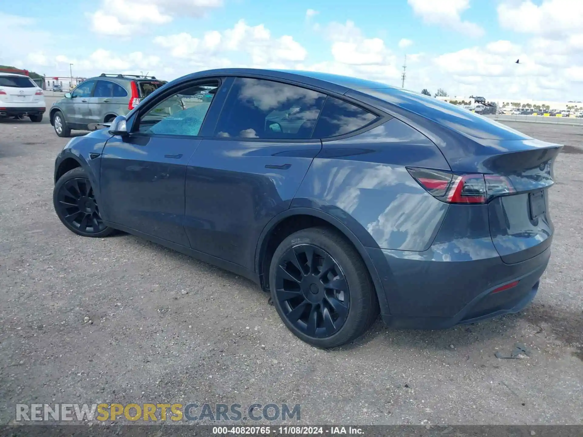 3 Photograph of a damaged car 7SAYGDEE6NA003715 TESLA MODEL Y 2022