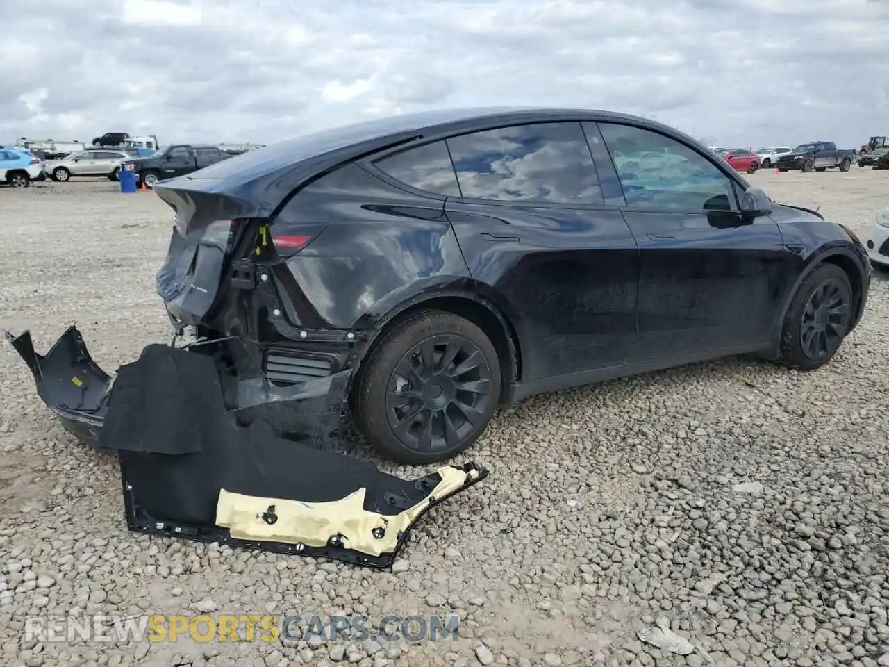 3 Photograph of a damaged car 7SAYGDEEXNA006309 TESLA MODEL Y 2022
