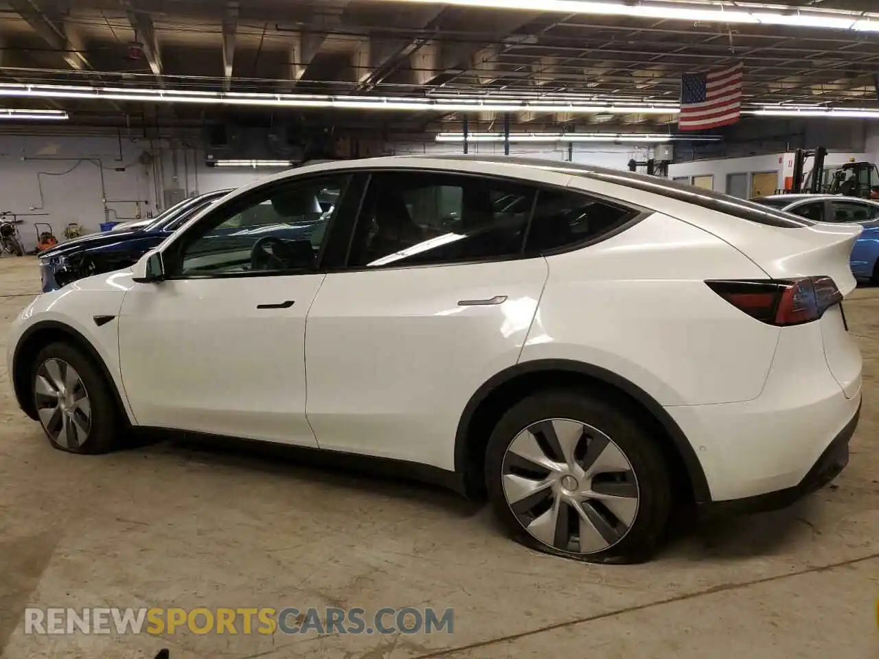 2 Photograph of a damaged car 7SAYGDEEXNA013017 TESLA MODEL Y 2022